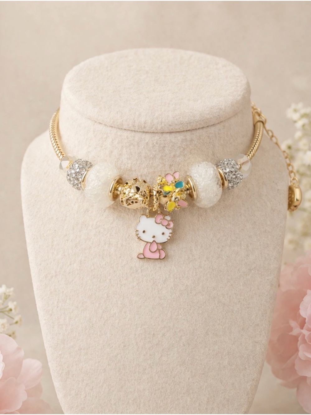Hello Kitty Gold Bracelet with Pink and White Enamel Charms